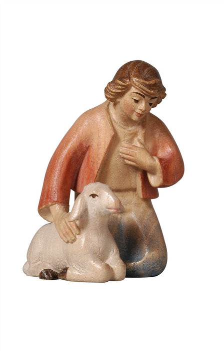 Pema Shepherd Kneeling With Sheep