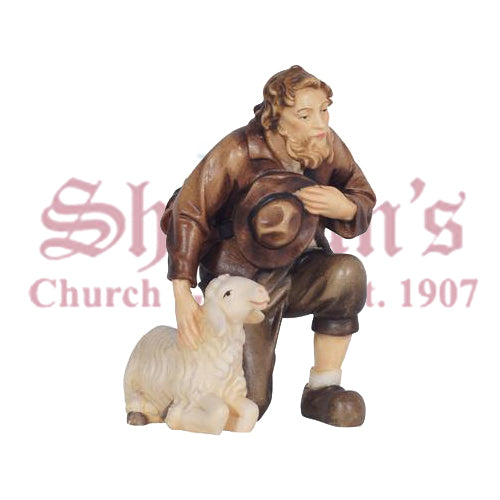 Kostner Shepherd Kneeling With Sheep